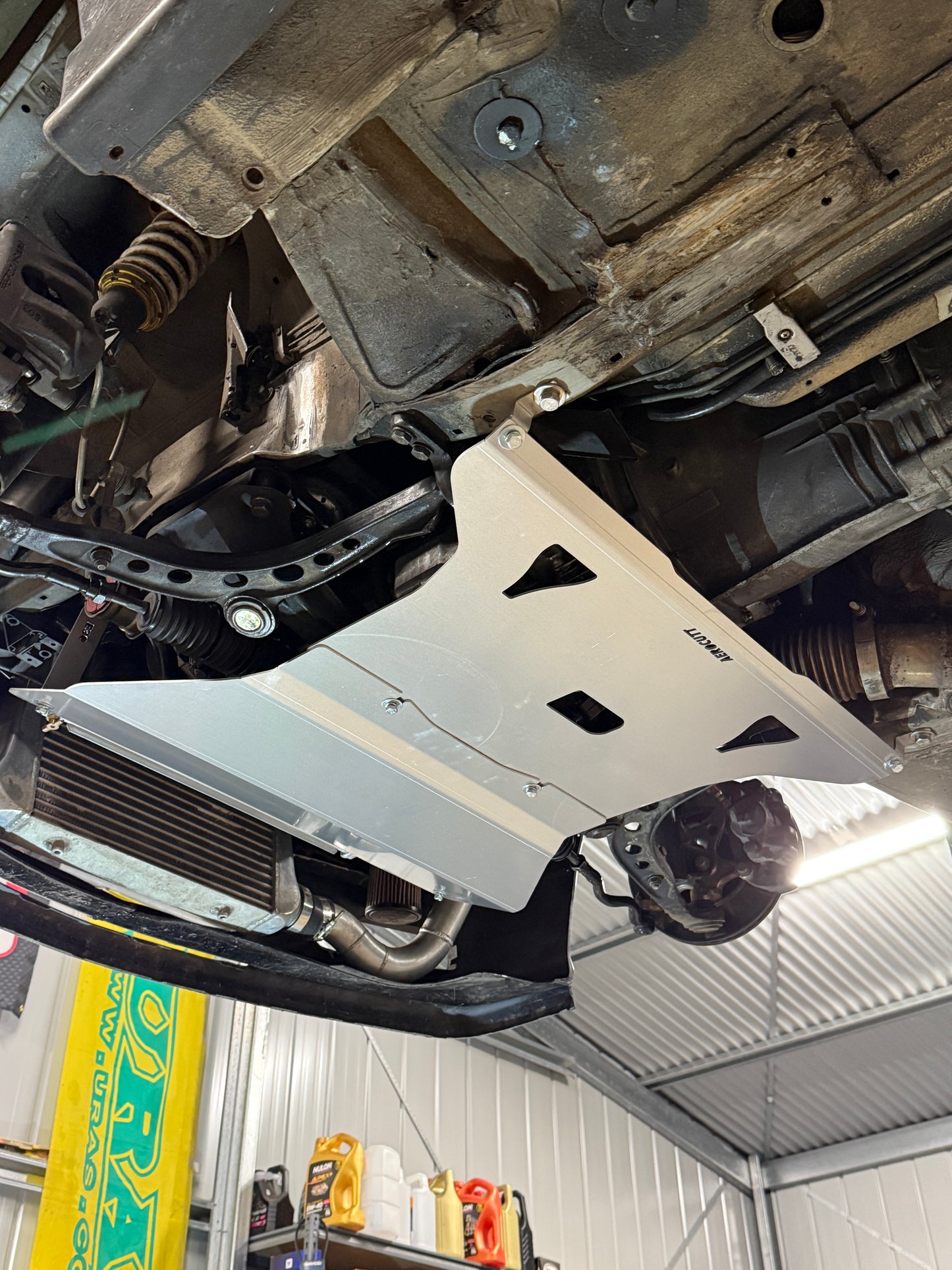 E36 bmw Engine Panel Underbody Protection Bash Skid Plate undertray replacement sump guard front tie in panel splitter aero aerocutt aerocut oil 3d render aerocutt scan 318i 320i 323i 325i 328i 330i