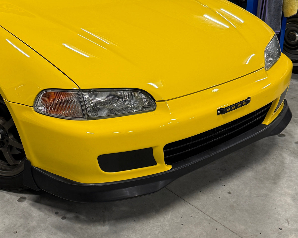 Honda Civic EG front bumper bar with Aerocutt plastic fog light delete blank plates installed