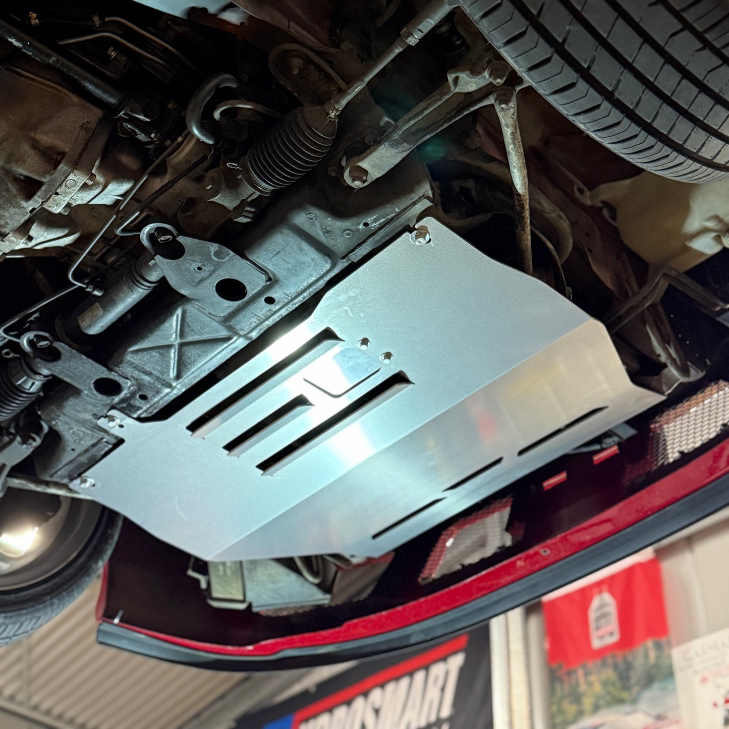 the underfloor of a nissan stagea with a skid plate from aerocutt 