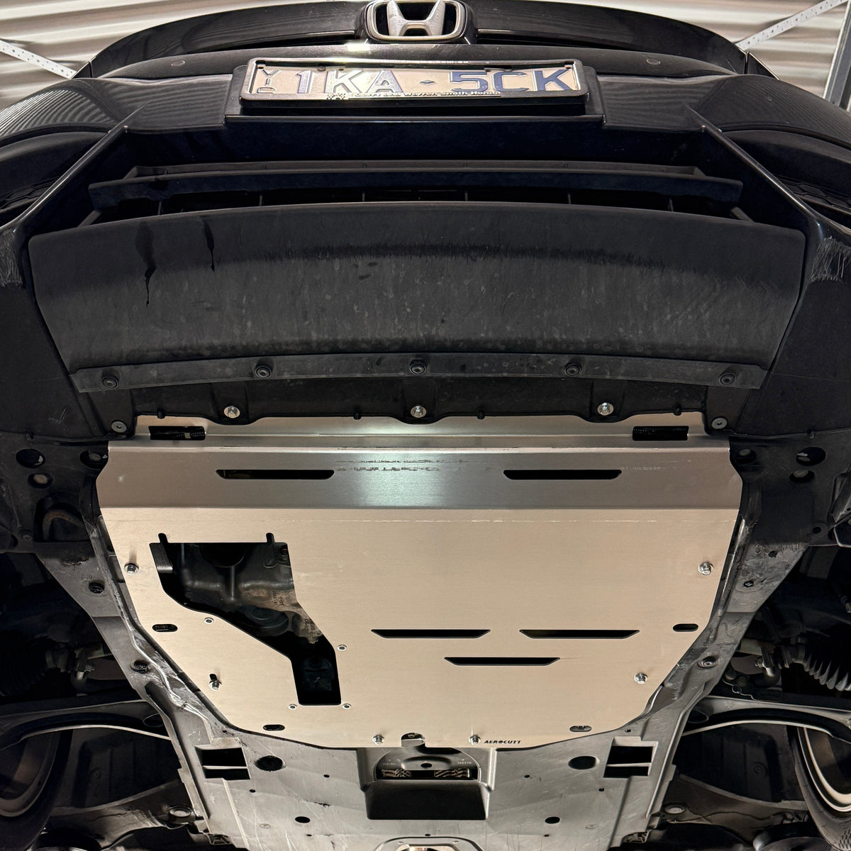 underside of a Honda Civic FK with Aerocutt aluminium undertray installed
