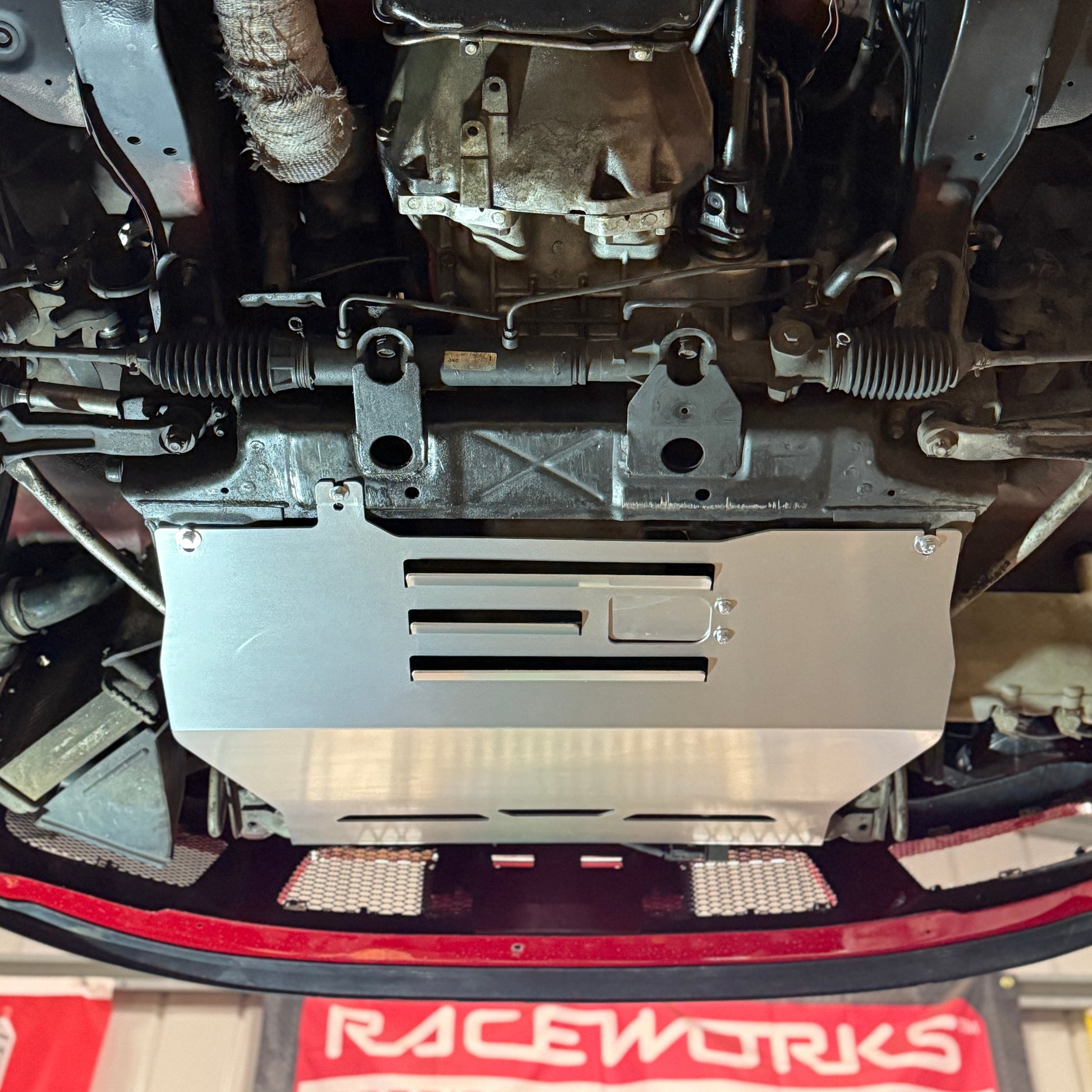 the underfloor of a nissan stagea with a skid plate from aerocutt 