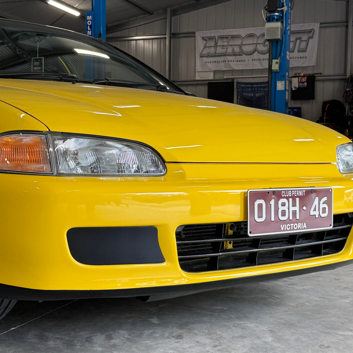 Honda Civic EG front with Aerocutt plastic fog light delete blank plates installed