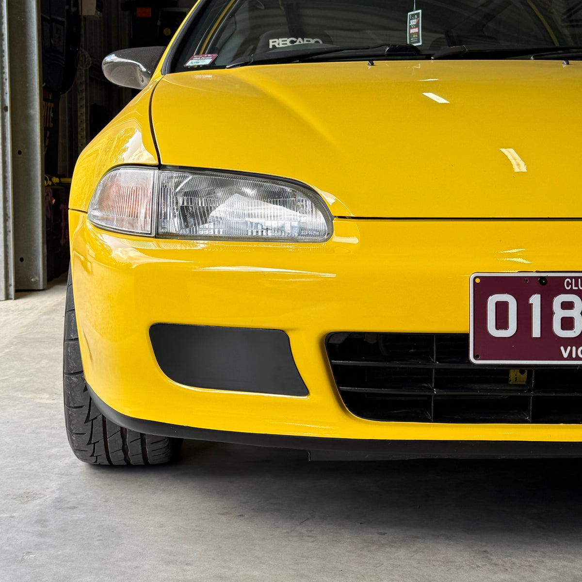 Honda Civic EG front with Aerocutt plastic fog light delete blank plates installed