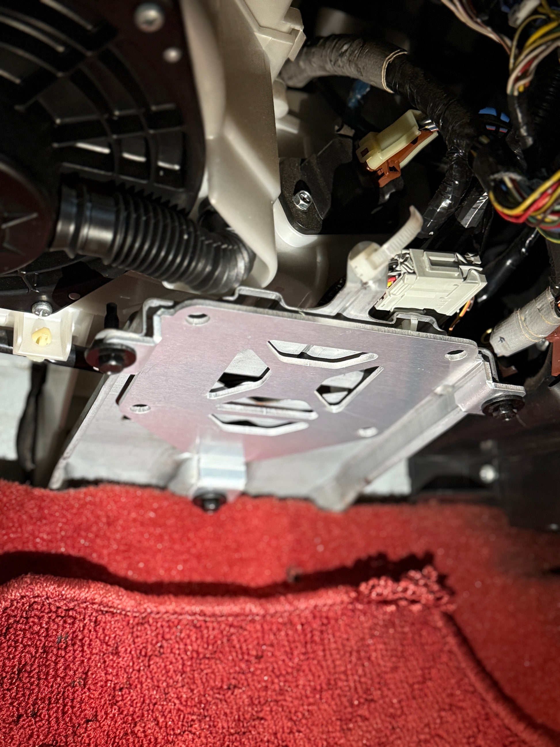 Close-up of car interior ecu mounting mechanism with wiring integra dc5