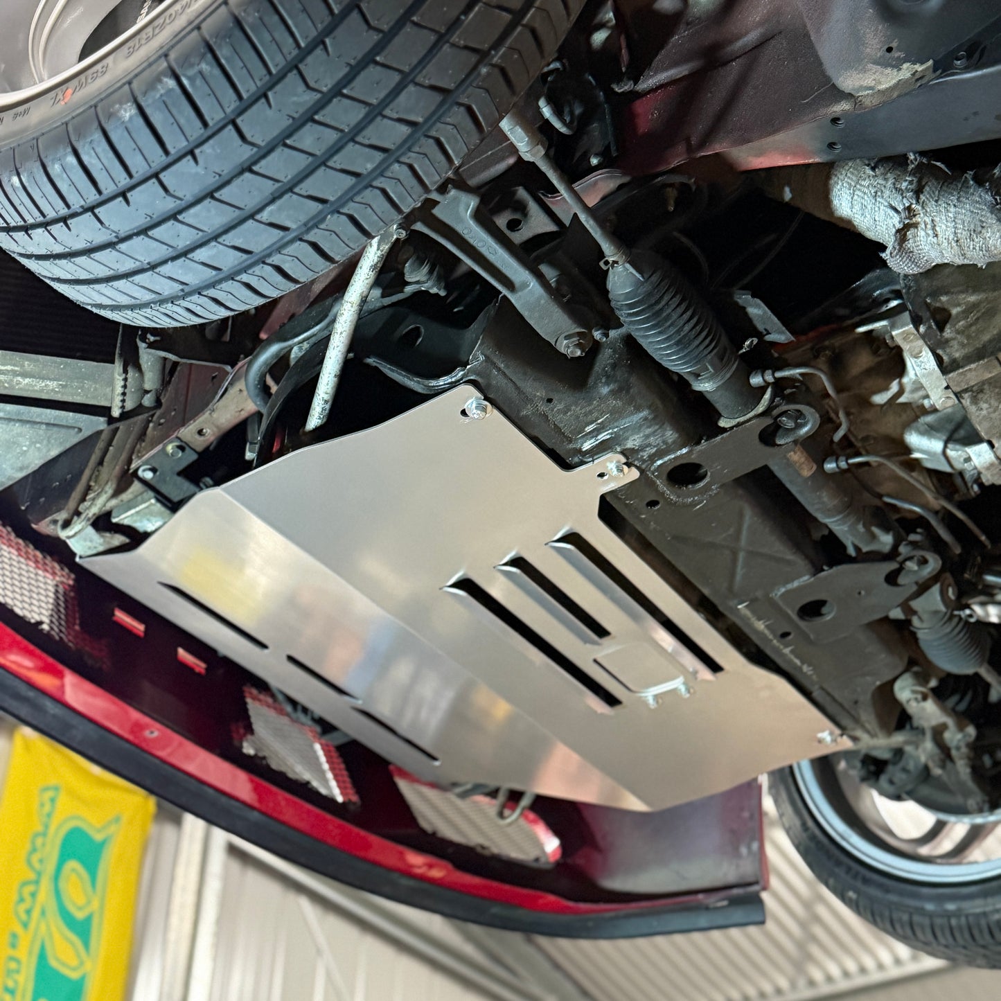 the underfloor of a nissan stagea with a skid plate from aerocutt 