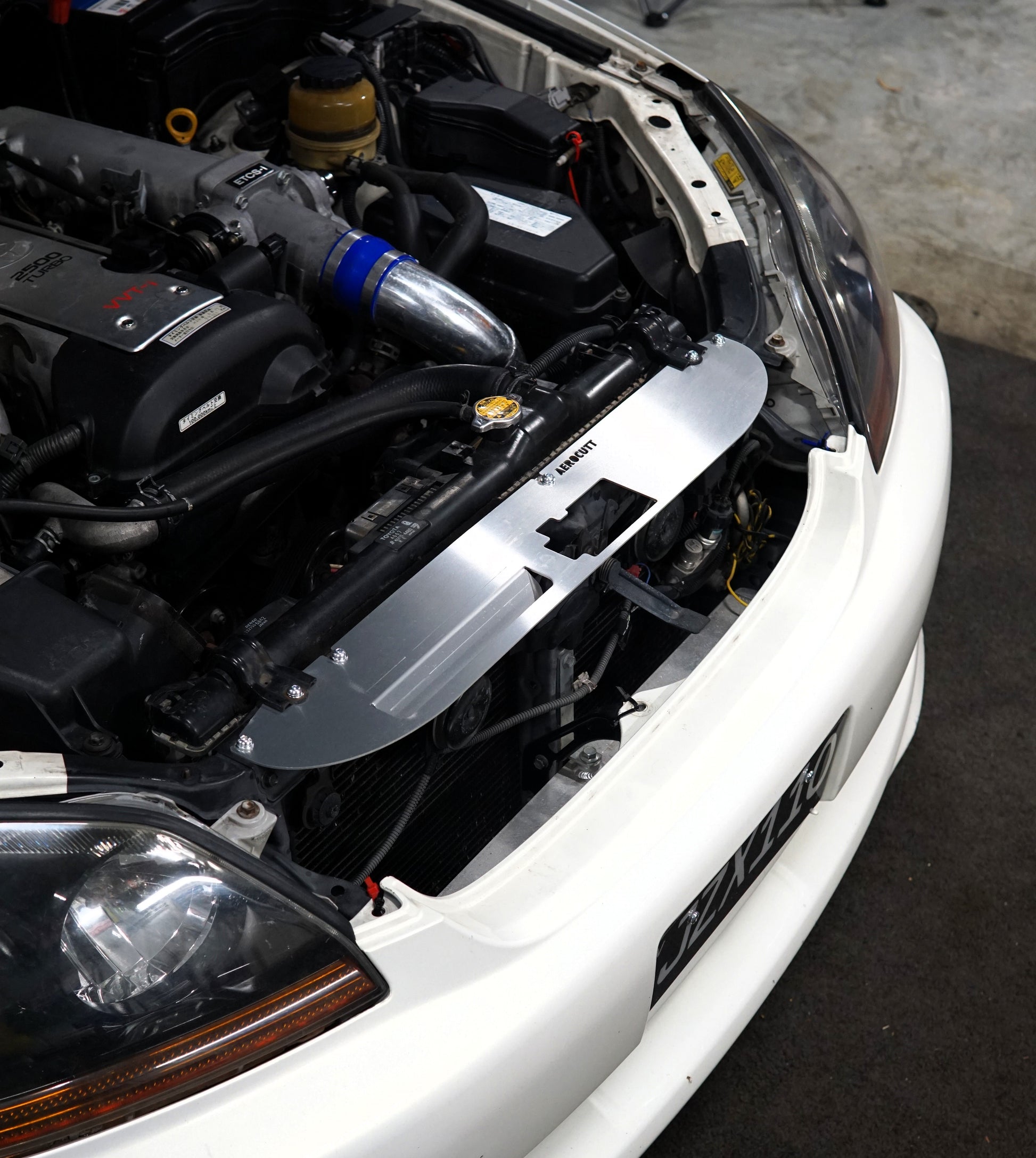 jzx110 toyota mk2 with aerocutt engine bay cooling panel installed