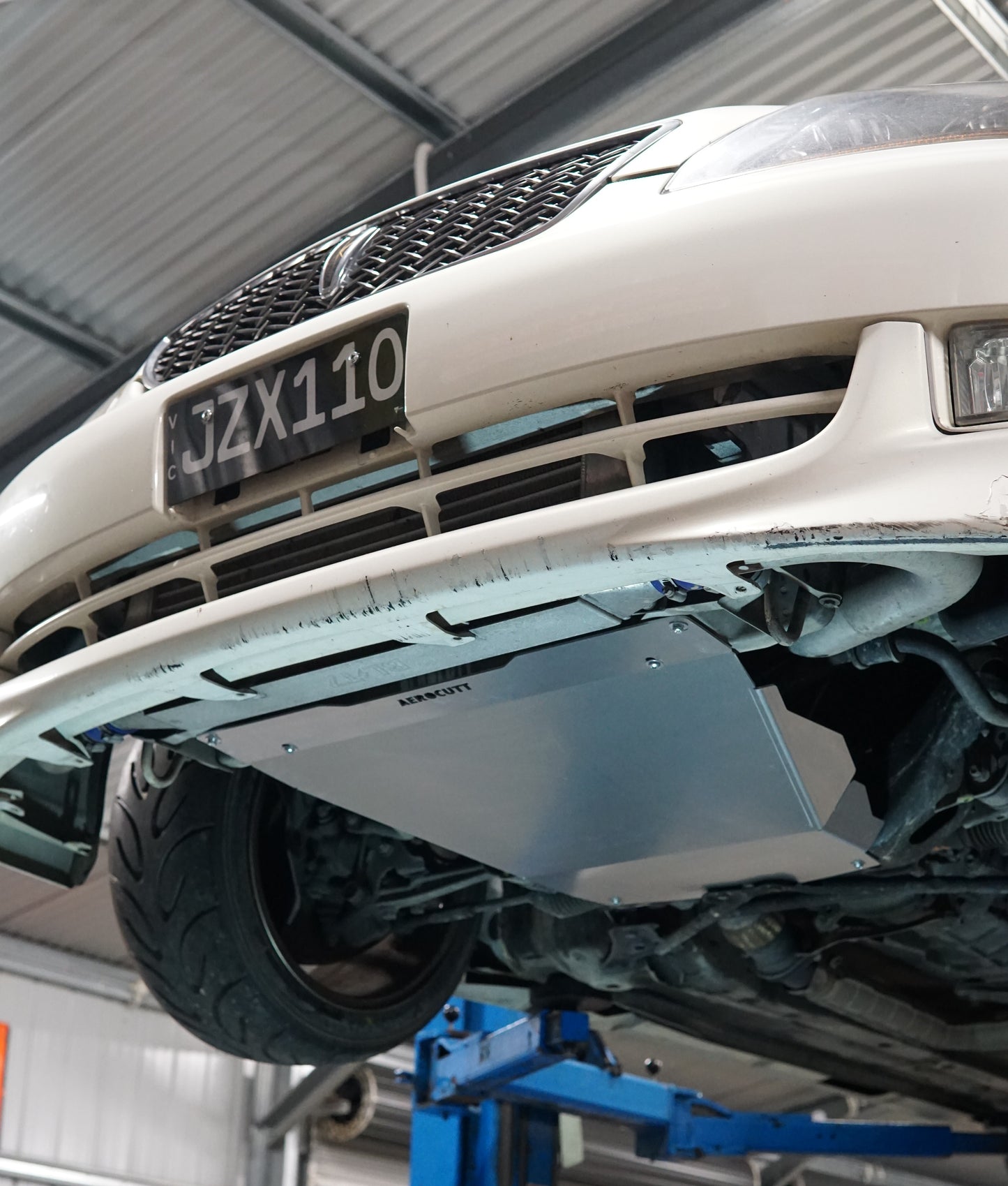 toyota jzx110 mark 2 underneath with aluminium aerocutt bash plate installed