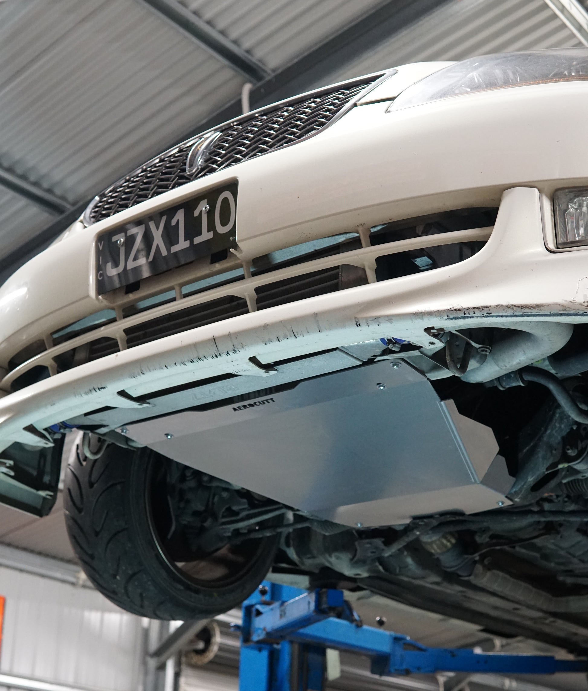 toyota jzx110 mark 2 underneath with aluminium aerocutt bash plate installed