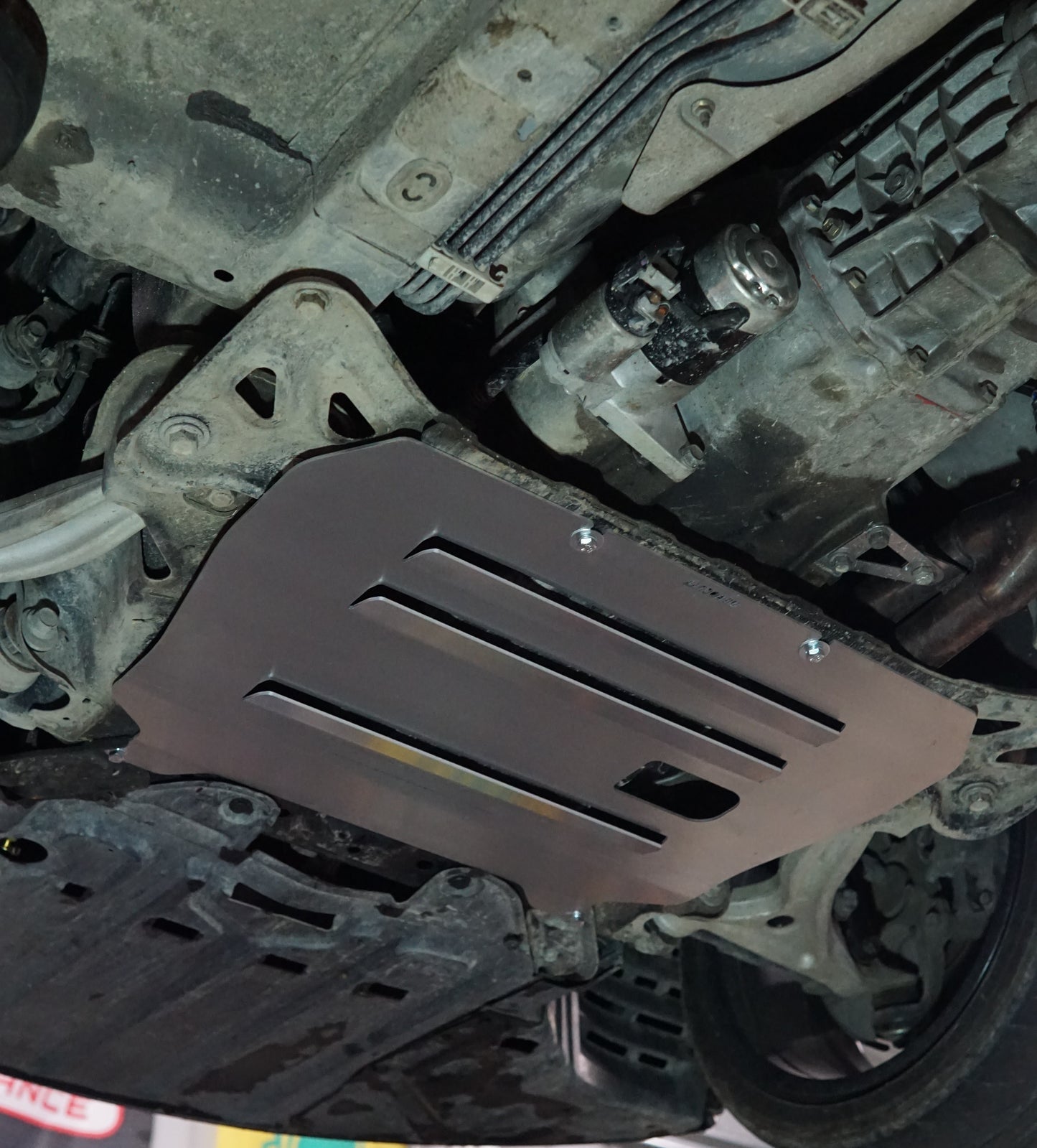 Mazda RX8 SE3P underneath with Aerocutt sump guard Plate Installed