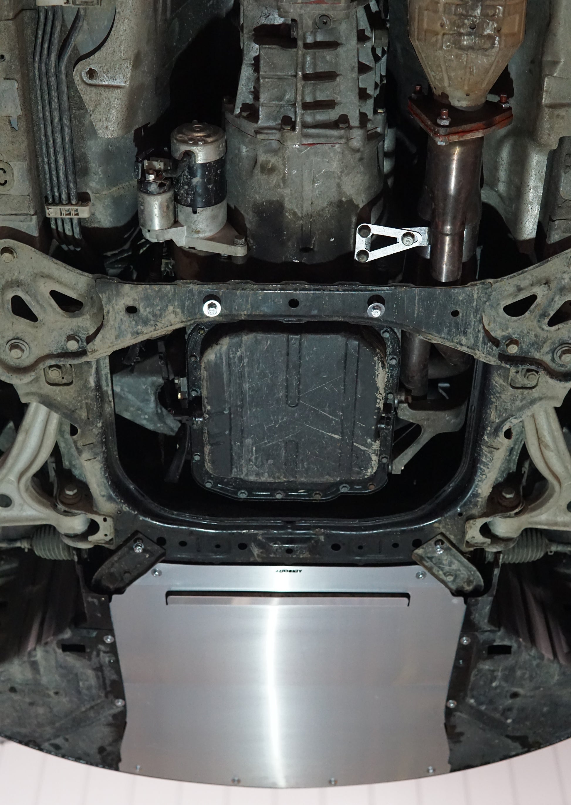 Mazda RX8 underside with Aerocutt front aero protection panel installed