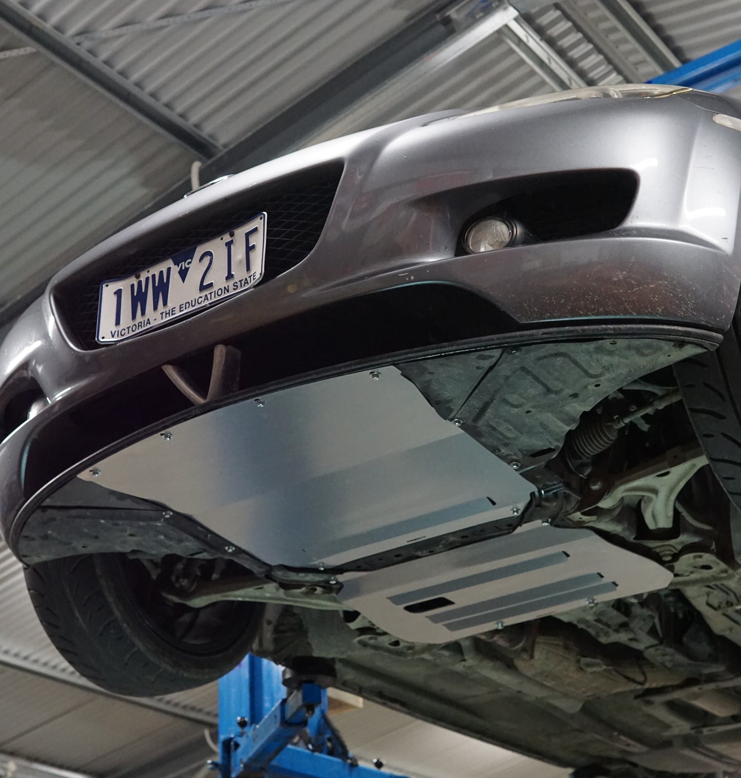 Mazda RX8 underside with Aerocutt front aero panel and sump guard installed