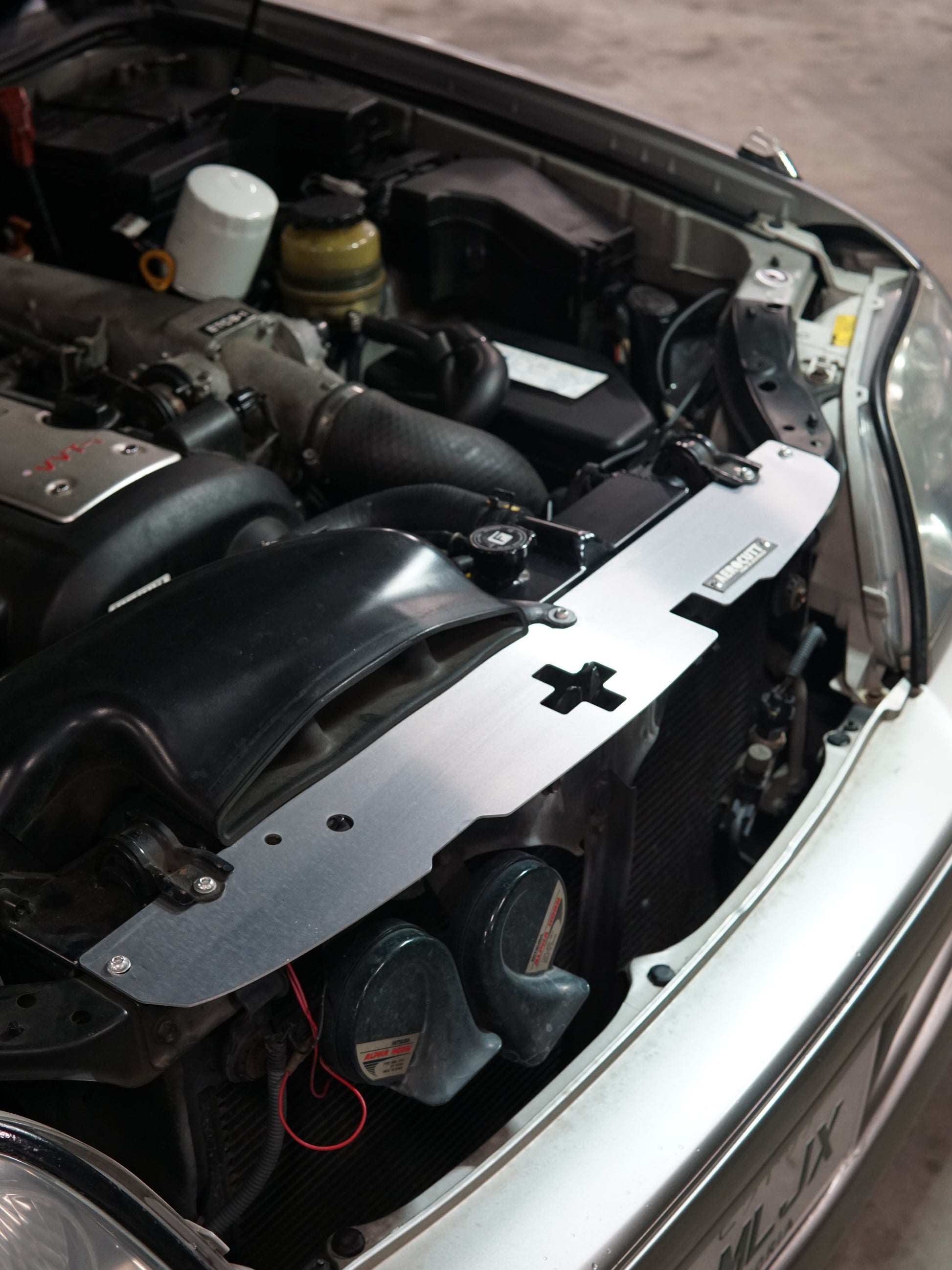 Toyota Crown JZS171 engine bay with Aluminium dress up panel