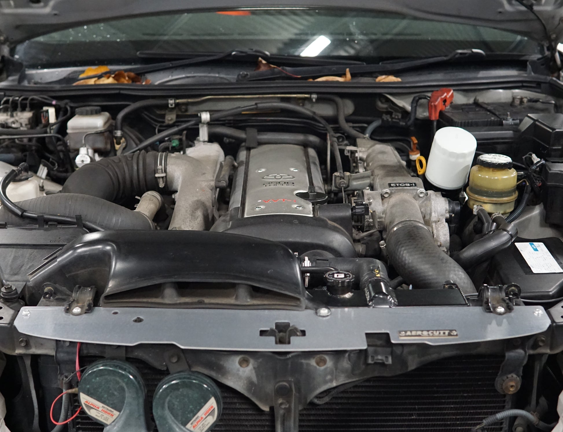 Toyota Crown JZS171 engine bay with Aerocutt Aluminium Radiator Cooling Panel