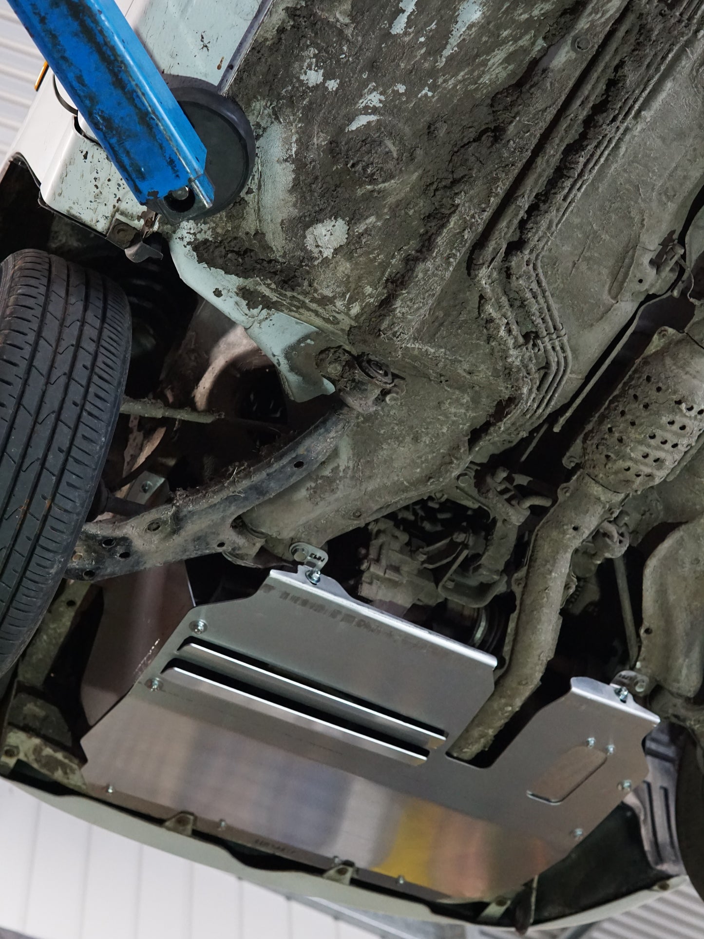 Toyota Starlet EP91 underneath rear with an Aerocutt aluminium bash plate installed