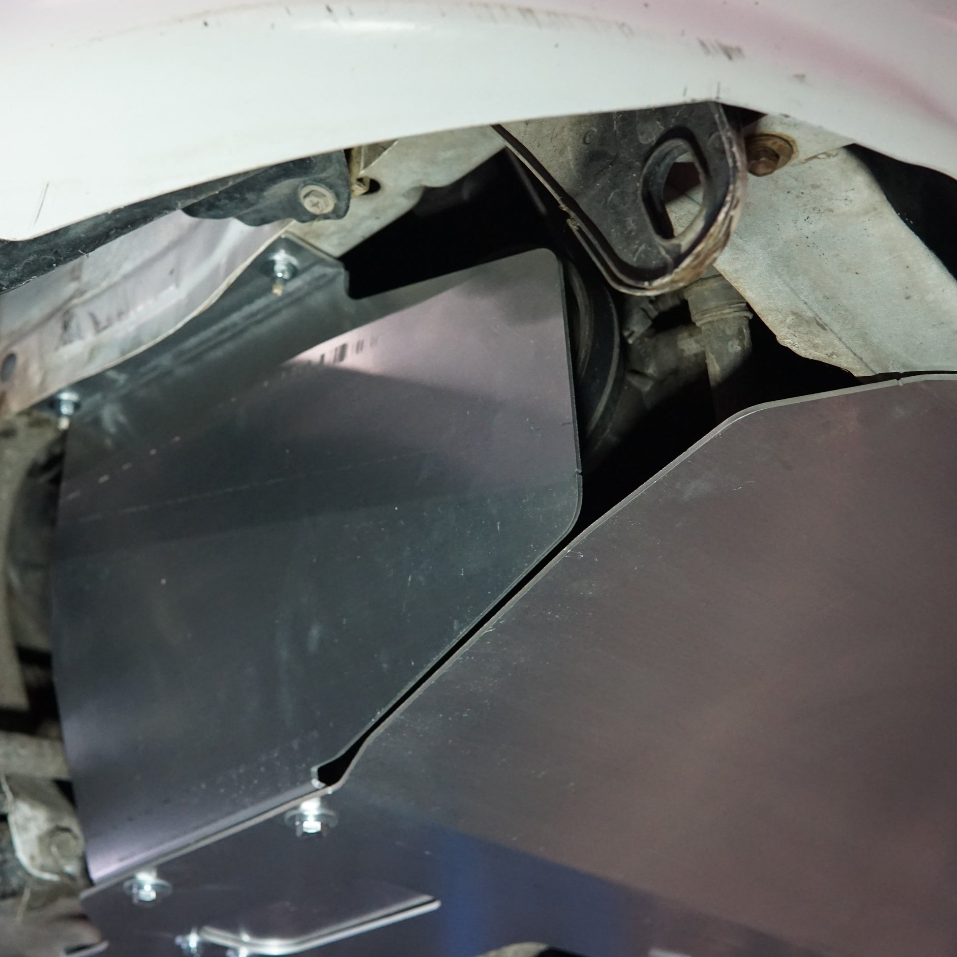 Toyota Starlet EP91 underside with an Aerocutt aluminium sump guard installed protecting the engine