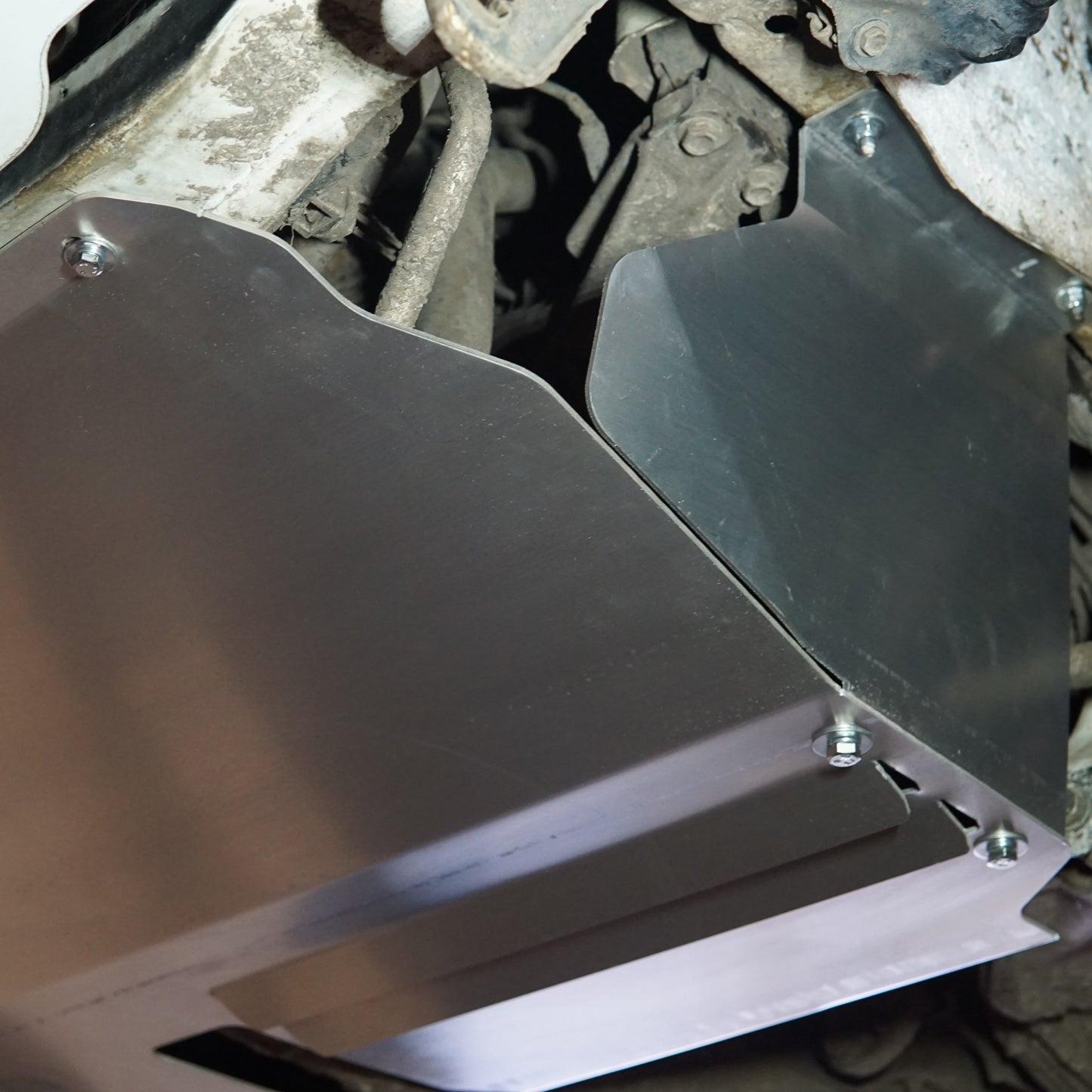 Toyota Starlet EP91 underside with an Aerocutt aluminium sump guard and side plates installed