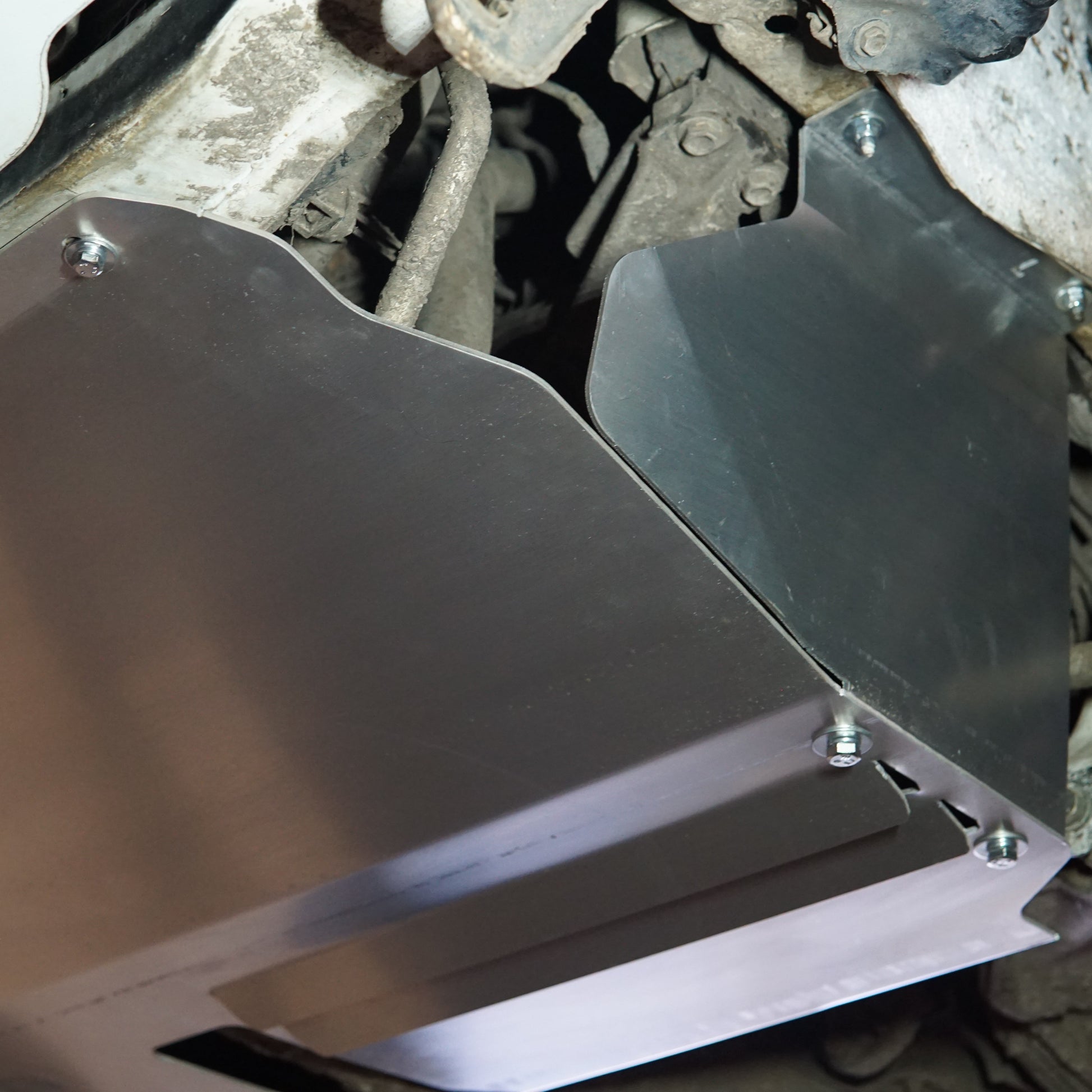 Toyota Starlet EP91 underside with an Aerocutt aluminium sump guard and side plates installed