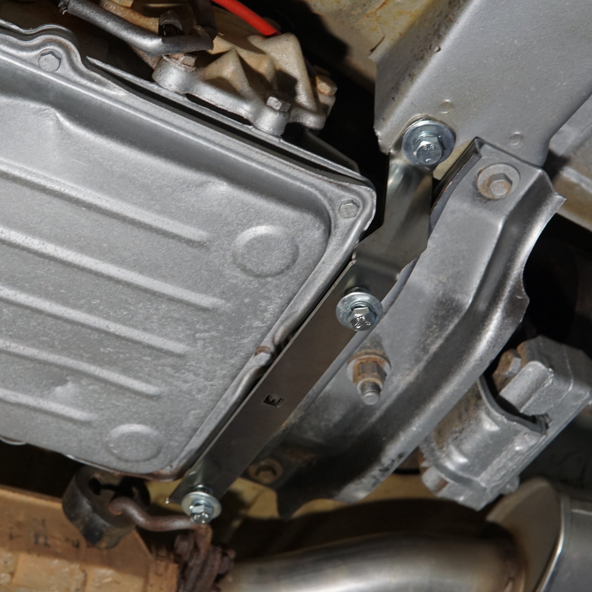 Ford Falcon EF EL Underneath With An Aerocutt Heavy Duty Transmission Plate Bracket Installed
