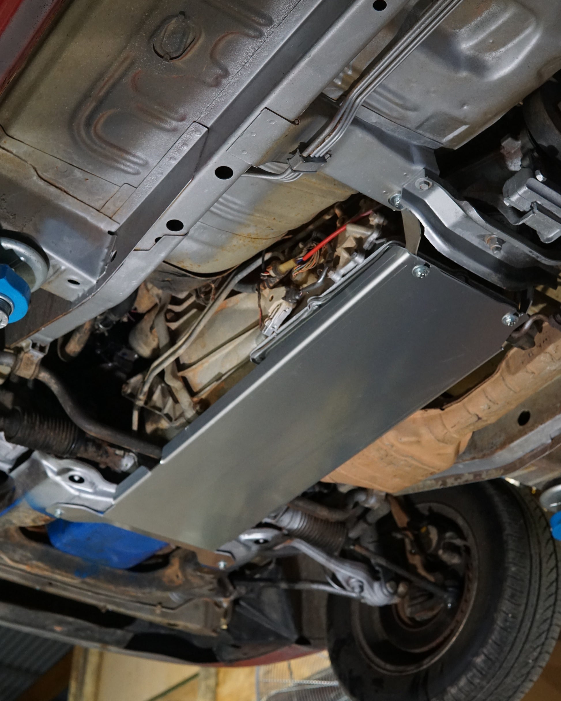 Ford Falcon EF EL Underside With An Aerocutt Heavy Duty Transmission Plate Installed