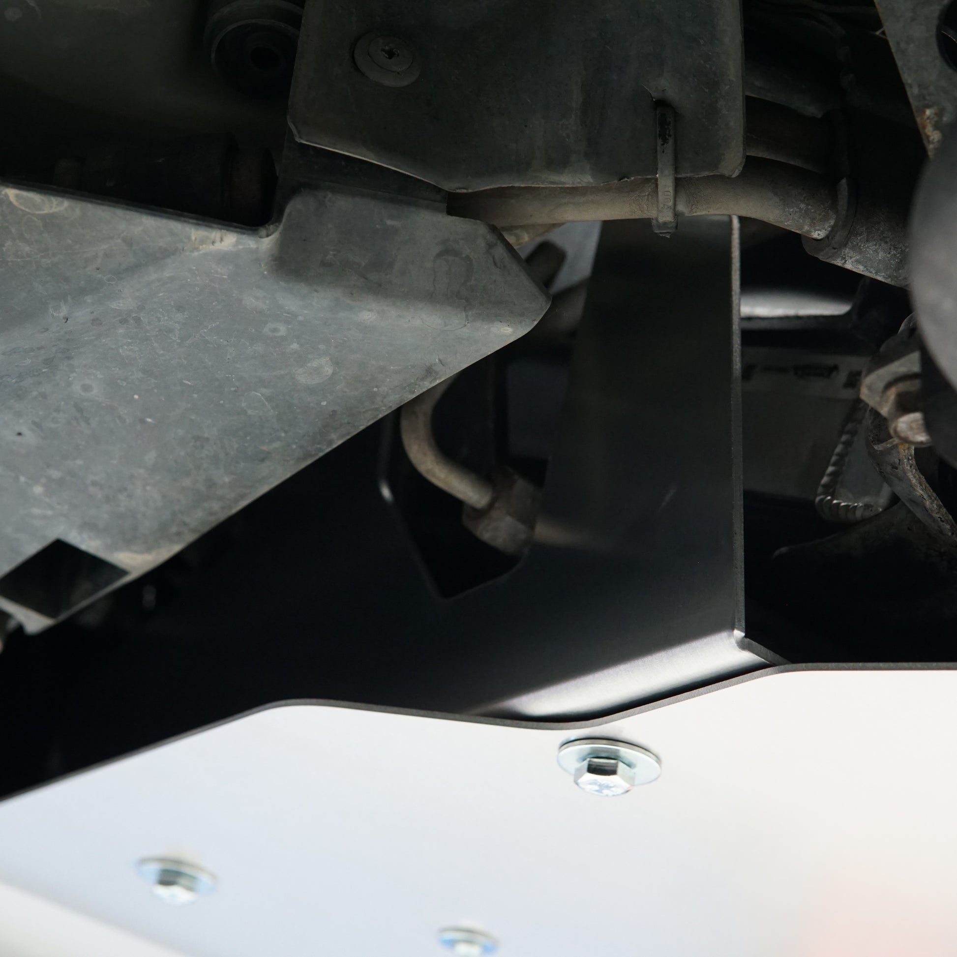 Mazda FD RX-7 Underbody with an Aerocutt front undertray brace and engine protection panel installed