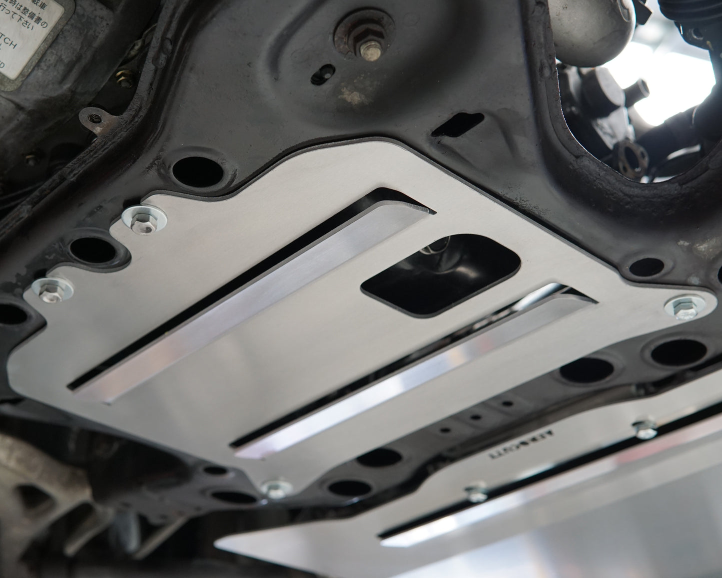 Mazda FD RX-7 Underbody with an Aerocutt engine protection panel installed.