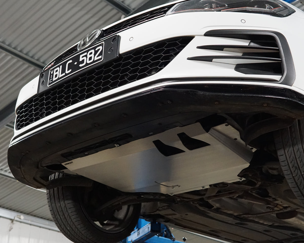 Aerocutt aluminium undertray fitted to the underneath of a Volkswagen golf GTI with service plate visible