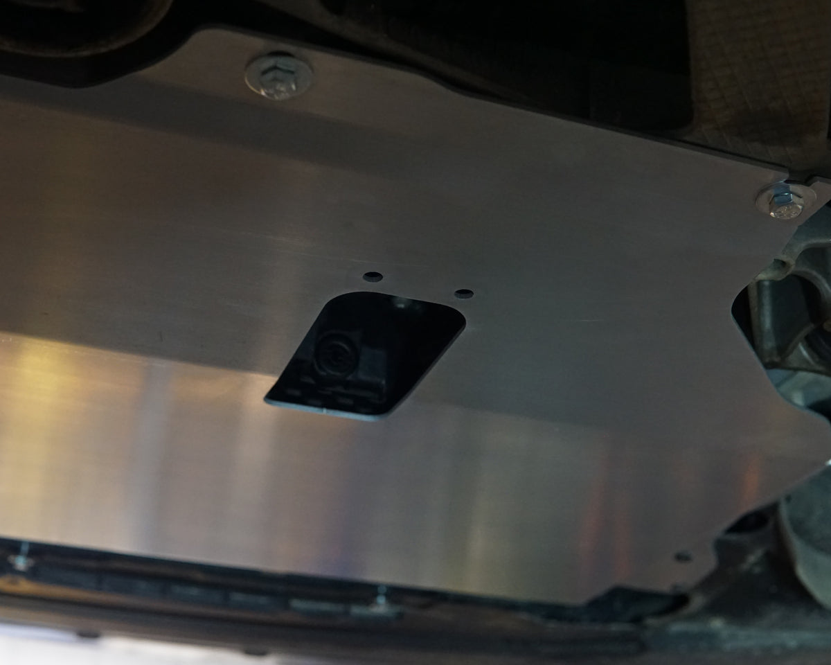 Aerocutt aluminium undertray fitted to the underneath of a Volkswagen golf GTI with oil drain hole visible