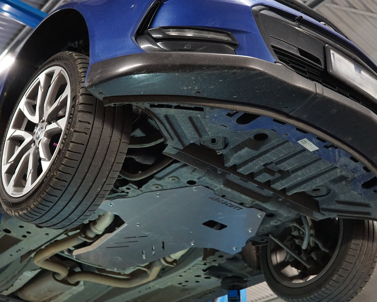 VE Commodore Underside on a lift with an aerocutt heavy duty aluminium undertray set with transmission and engine protection plate installed