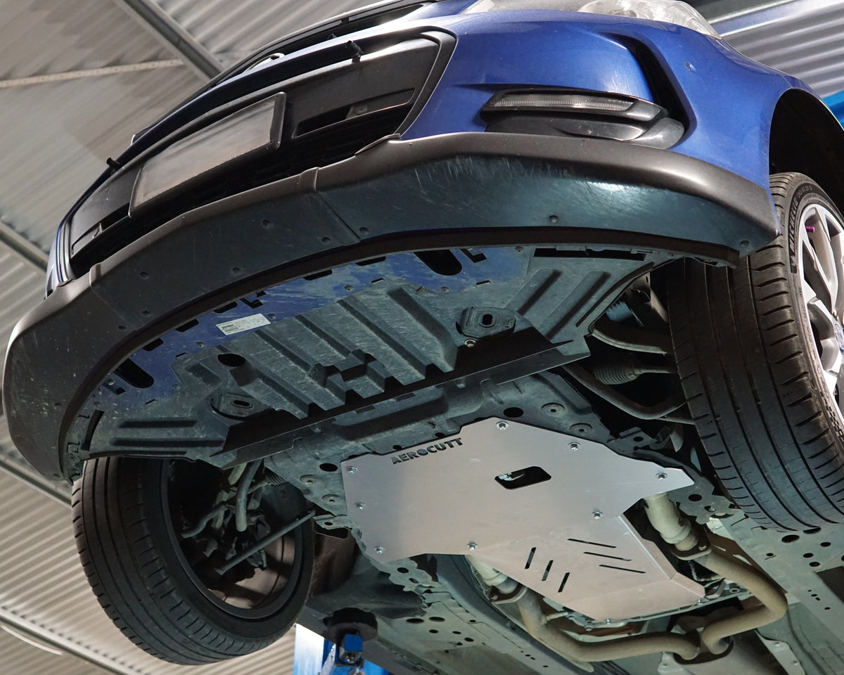 VF Commodore Underside on a lift with an aerocutt heavy duty aluminium undertray set with transmission and engine protection plate installed