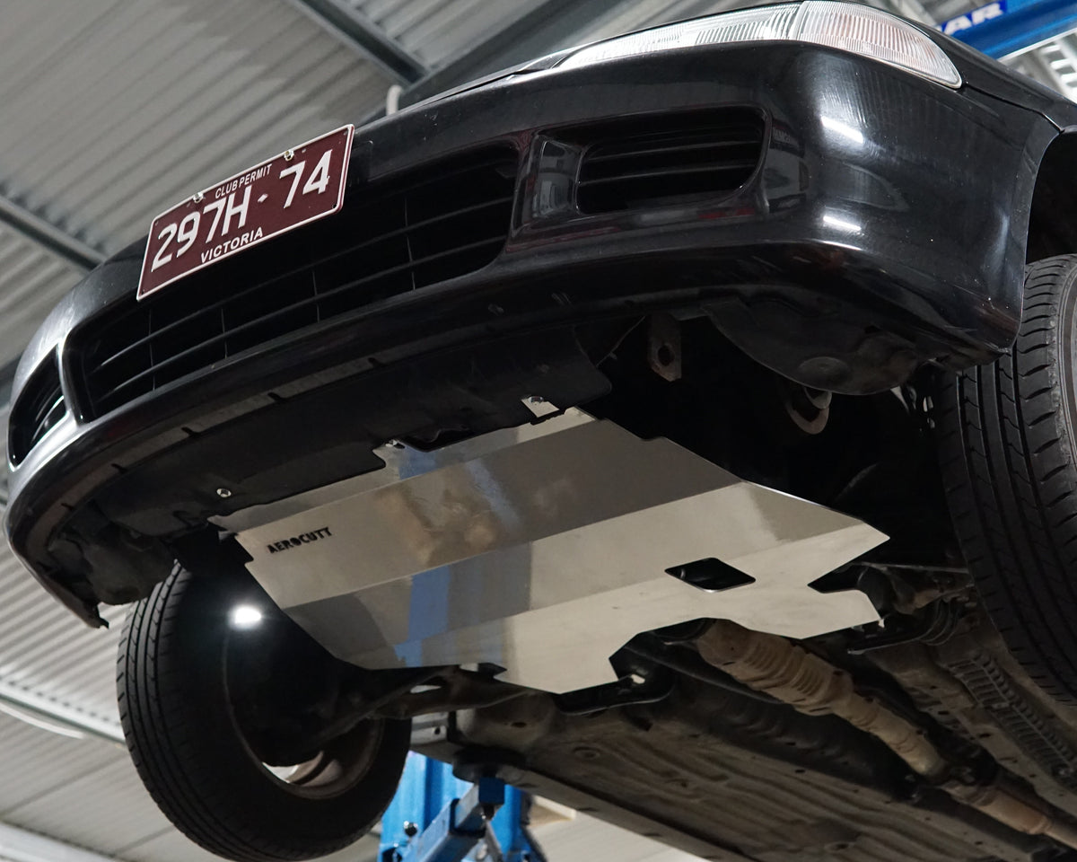Honda EG Civic underside with large aerocutt aluminium skid tray installed