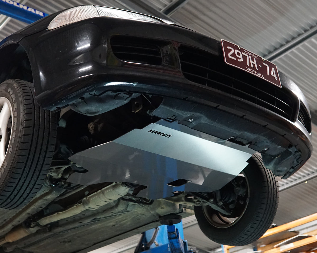 Honda EG Civic underside with large aerocutt aluminium skid plate installed