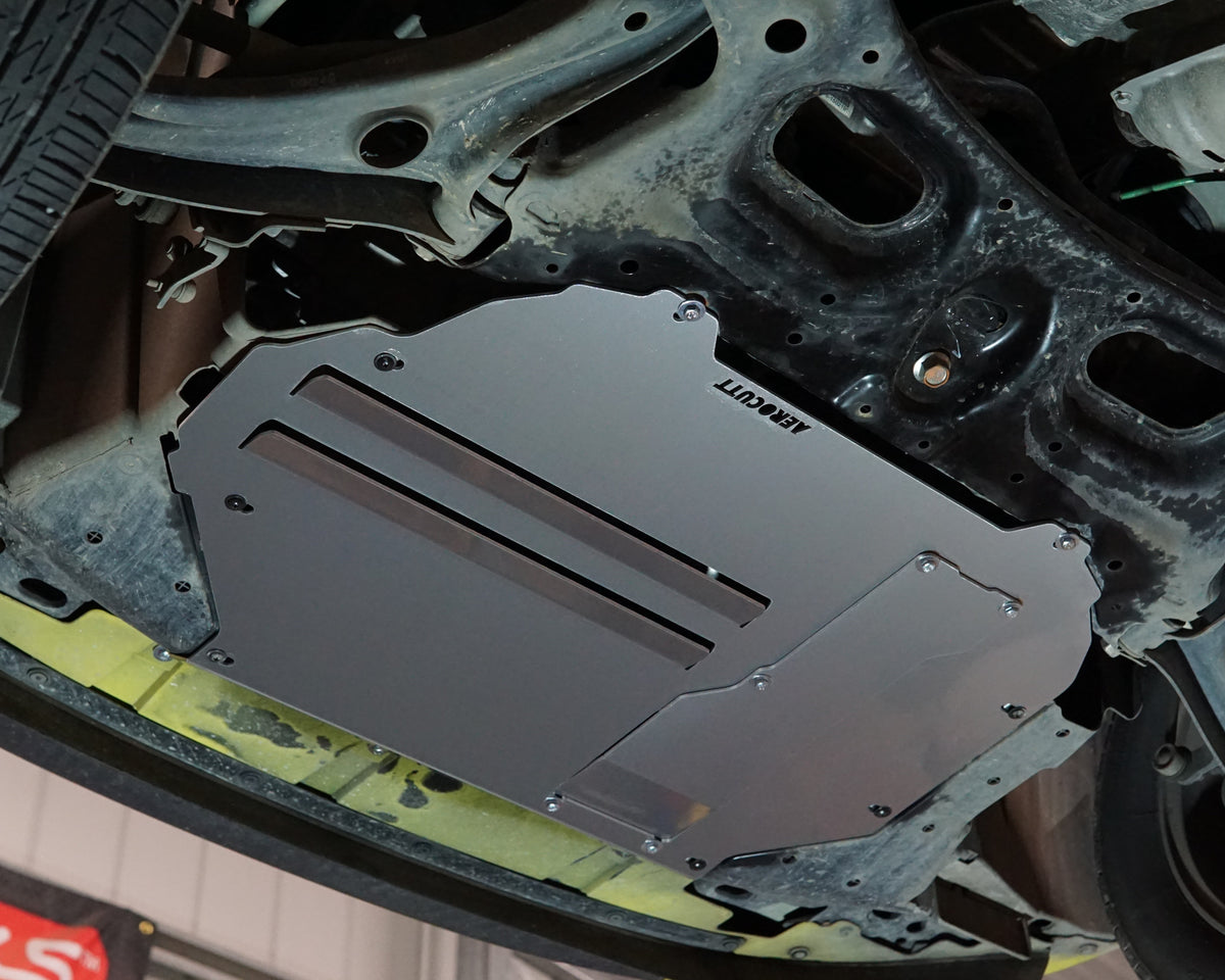 A yellow Honda GK Jazz Undercarriage With an Aerocutt bash plate undertray fitted
