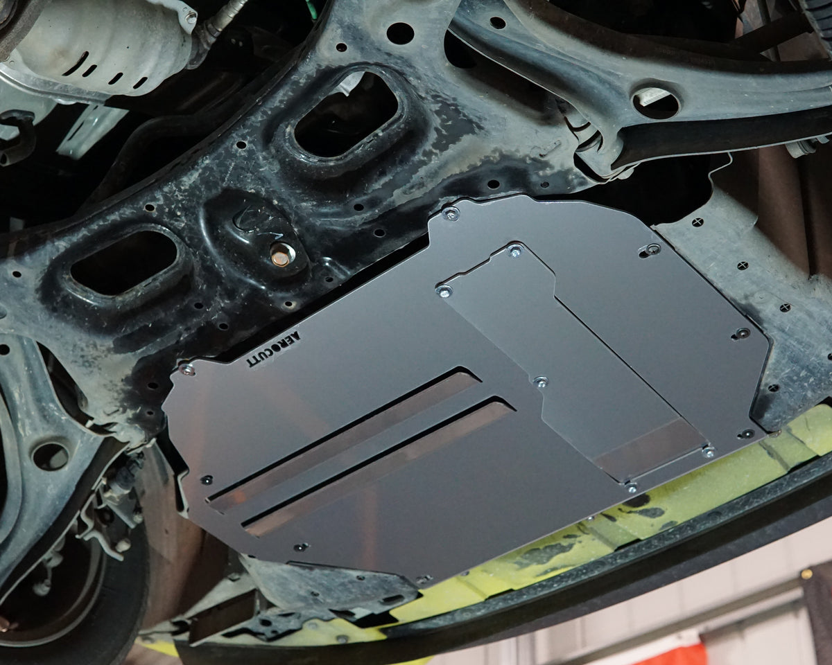 A yellow Honda GK Jazz Underbody With an Aerocutt bash plate fitted