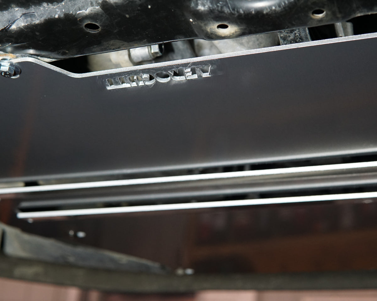 A yellow Honda GK Jazz Undercarriage With an Aerocutt bash plate undertray fitted
