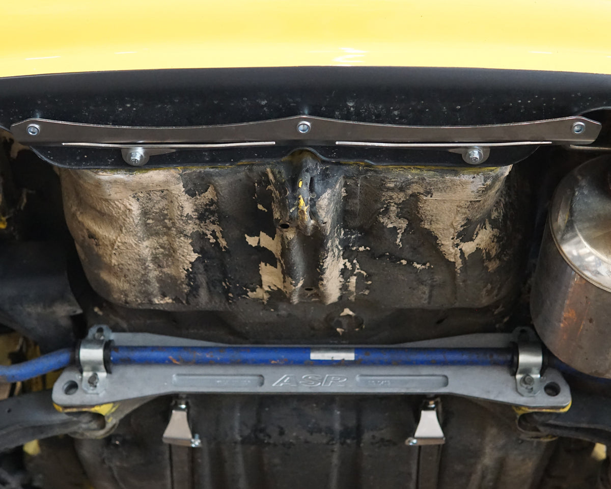 Rear undercarriage of a Honda Civic EG with a Aerocutt stainless steel diffuser brackets installed