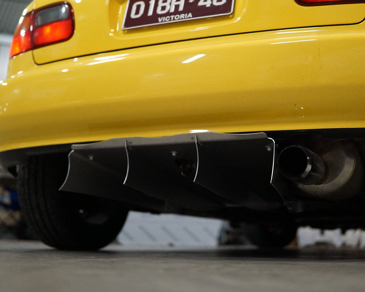 Rear underside of a Honda Civic EG with an Aerocutt aluminium diffuser installed