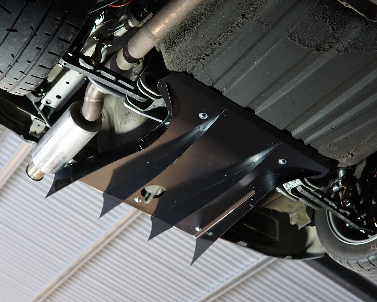 Rear underside of a Honda Civic 5th gen EG with a black Aerocutt aluminium diffuser installed
