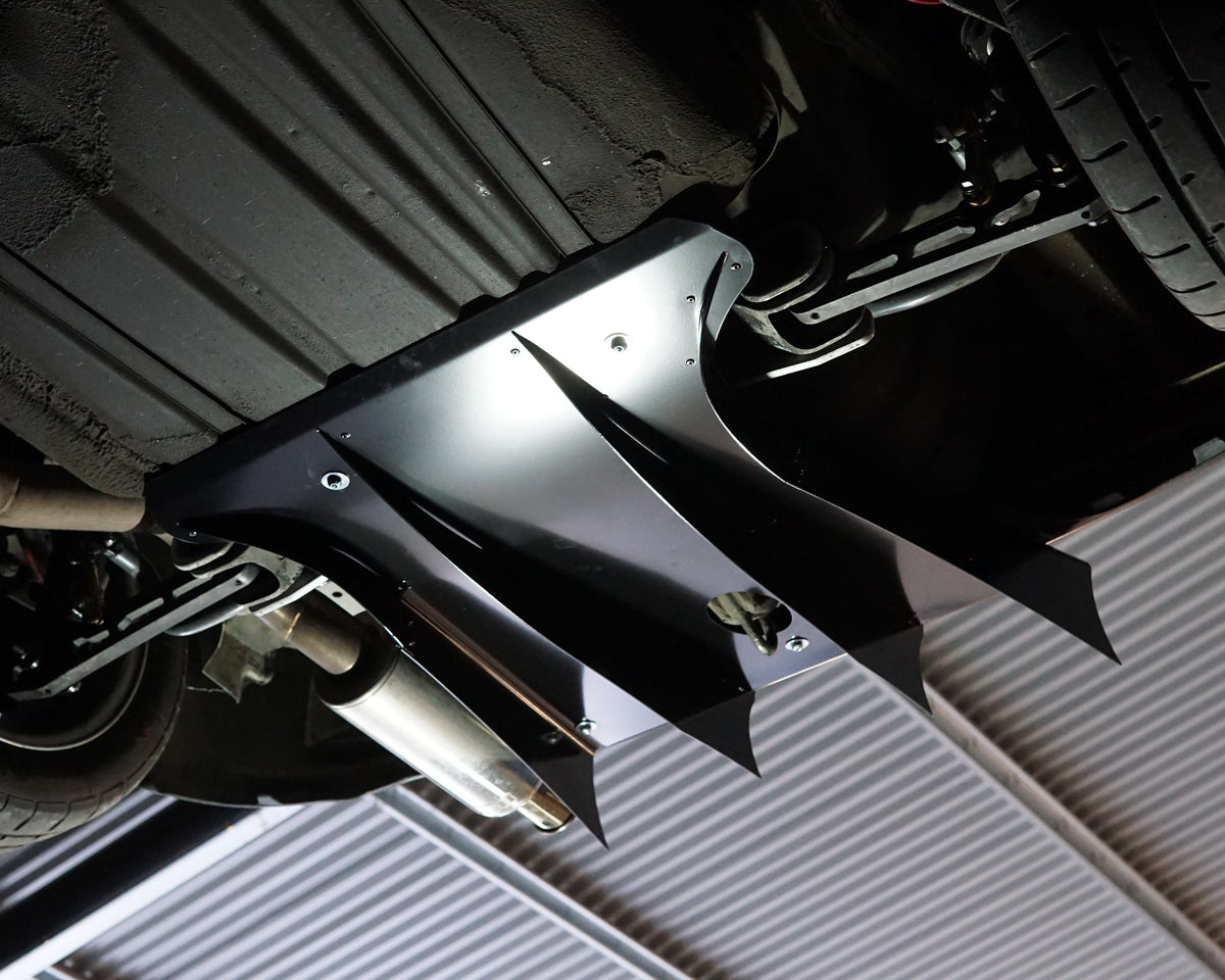 Rear underside of a Honda Civic 5th gen EG6 with a black Aerocutt aluminium diffuser installed