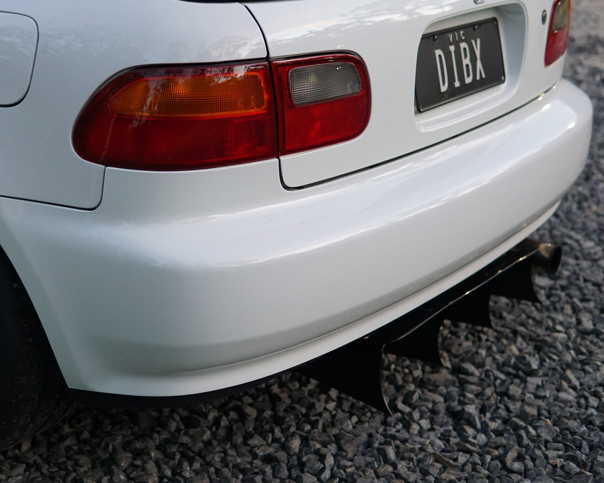 Rear of a Honda Civic 5th gen EG with a black Aerocutt aluminium diffuser installed