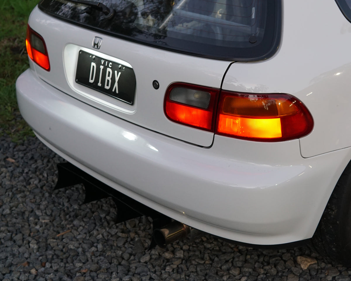 Rear of a Honda Civic 5th gen EG with a black Aerocutt aluminium diffuser installed