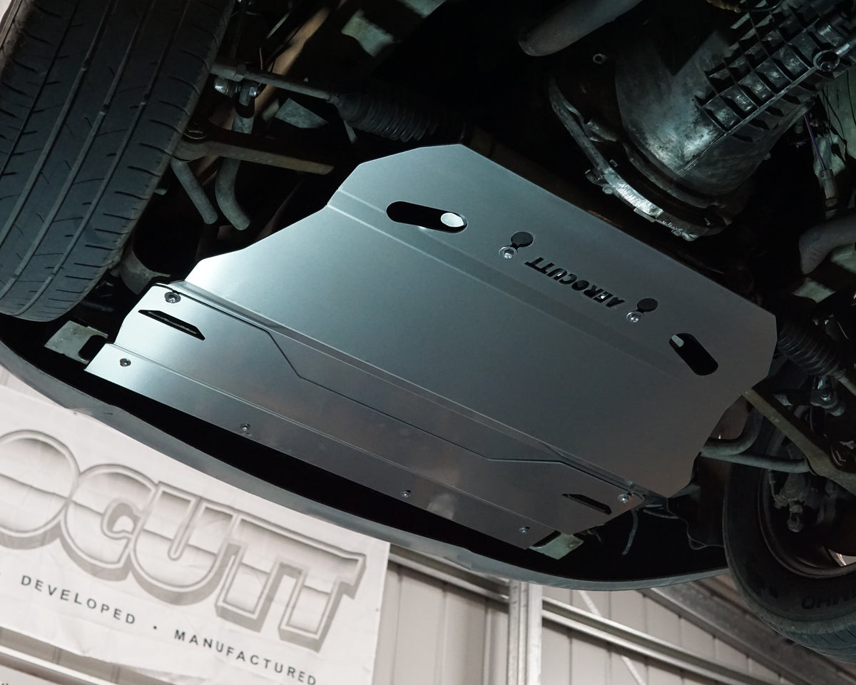 Holden Commodore VY front undercarriage with an Aerocutt aluminium heavy duty skid plate installed on the underside of the car