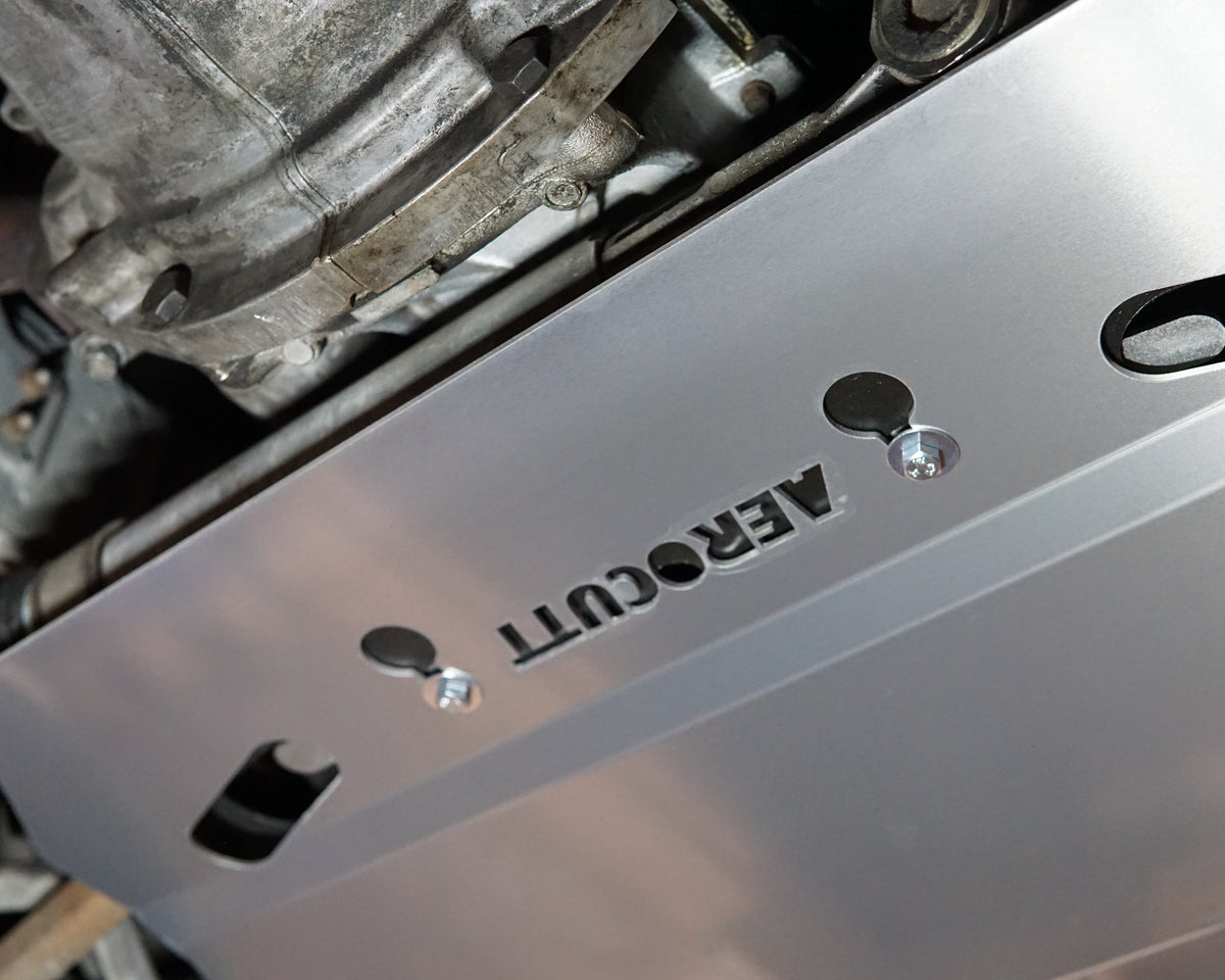 Holden Commodore VT front undercarriage with an Aerocutt steel heavy duty skid plate installed