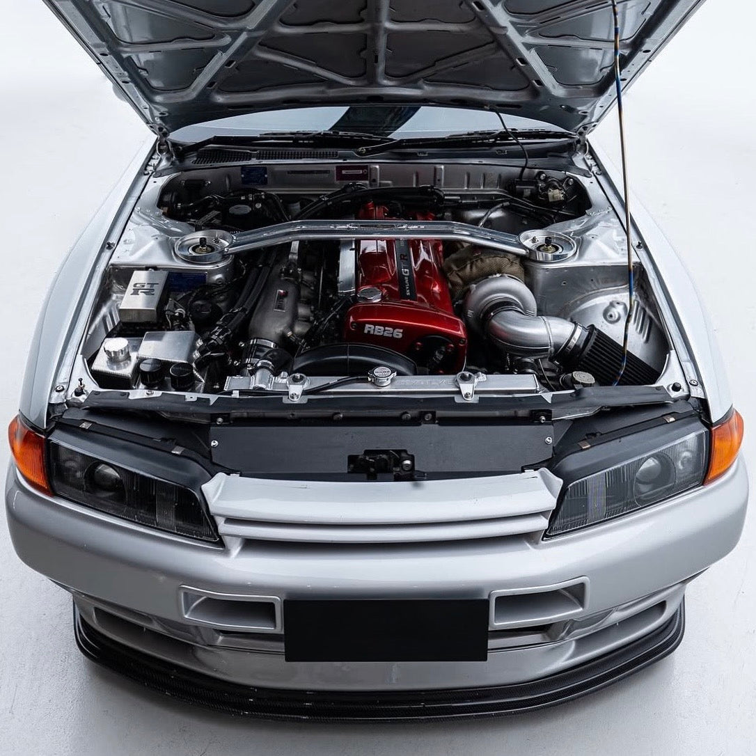 Nissan Skyline R32 GTR Engine Bay with Aerocutt black powder coated cooling panel set installed to neaten up the engine bay