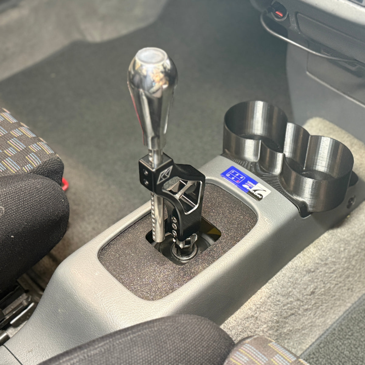 Honda Civic EG 5th generation interior shifter area with an Aerocutt ABS plastic shifter surround to suit K tuned short shifter