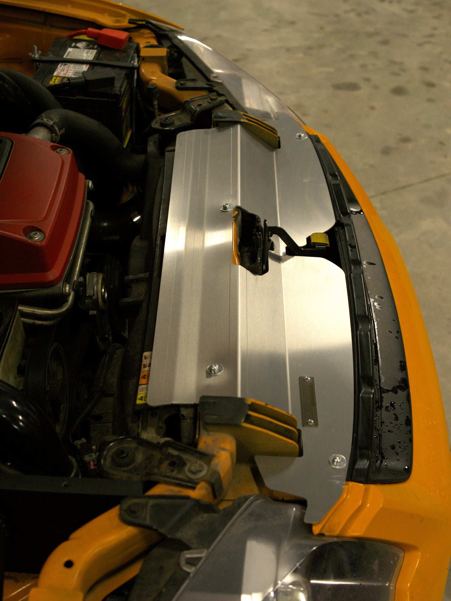 FG Ford falcon engine bay cooling panel on an orange xr6 turbo