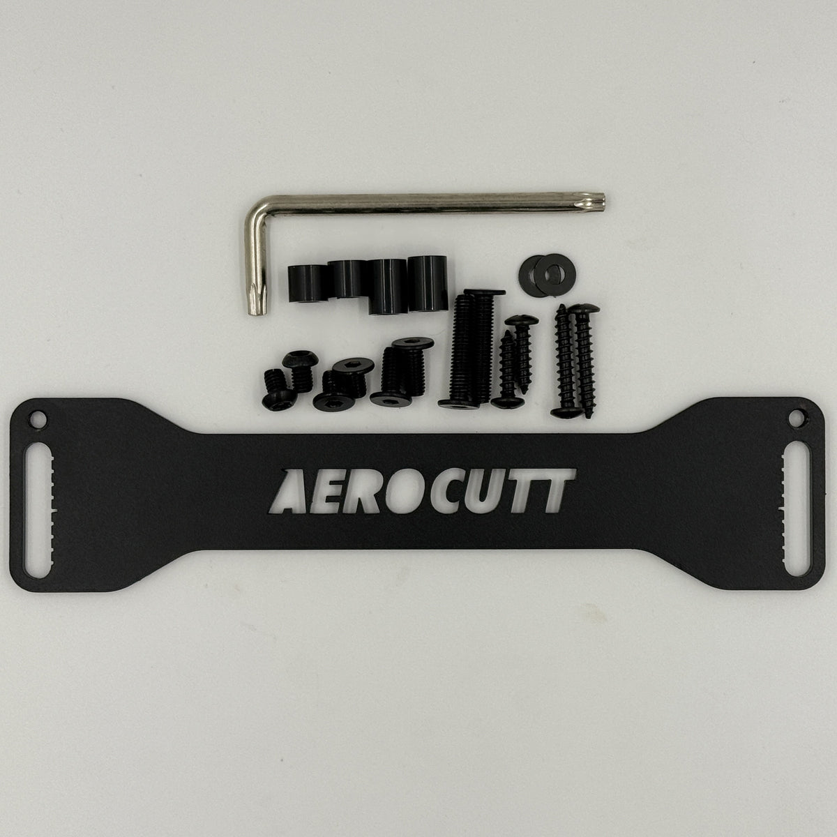 Aerocutt Number Plate Riser JDM number plate adapter shown with all included hardware and fasteners