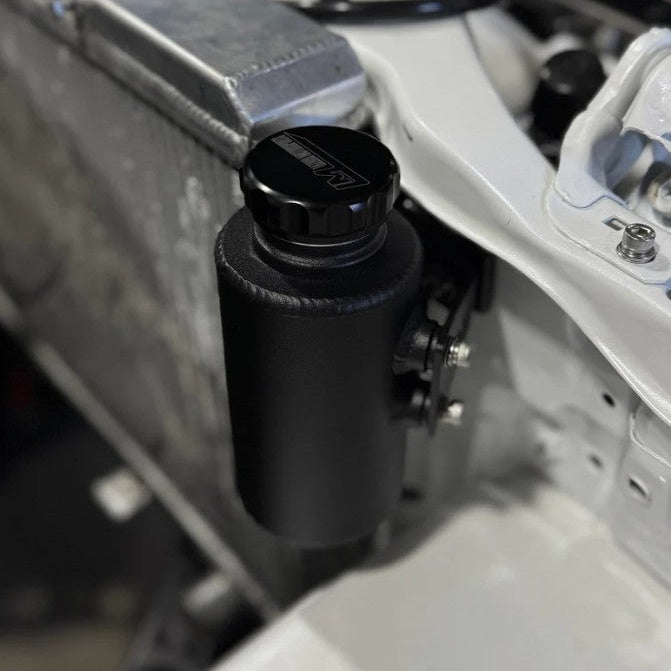 Nissan Silvia s13/180sx engine bay with Lazaro Motorsports overflow bottle mounted in powder coated black