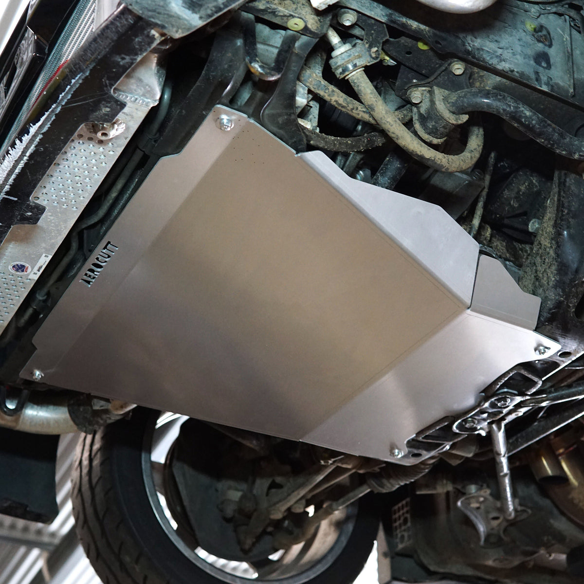 Lexus IS300 Underside with an aluminium Aerocutt skid plate installed for protection