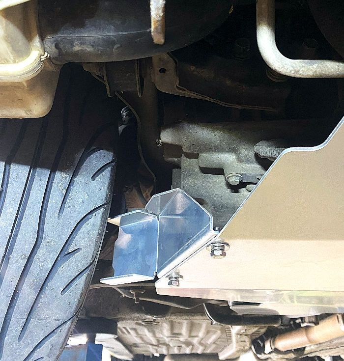 Honda EK Civic underside with large aerocutt aluminium skid plate installed showing brake ducts for brake cooling